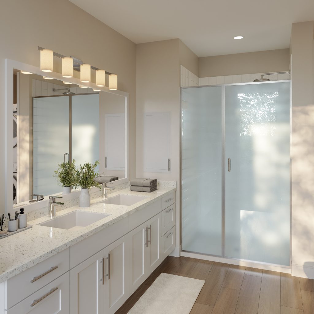 Bathroom with double-vanity sink and maple flooring